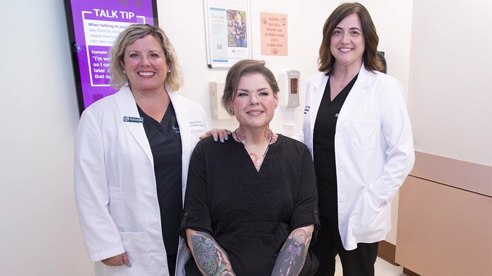 Kim Randall with Dr. Duke and Jessica Custer, NP